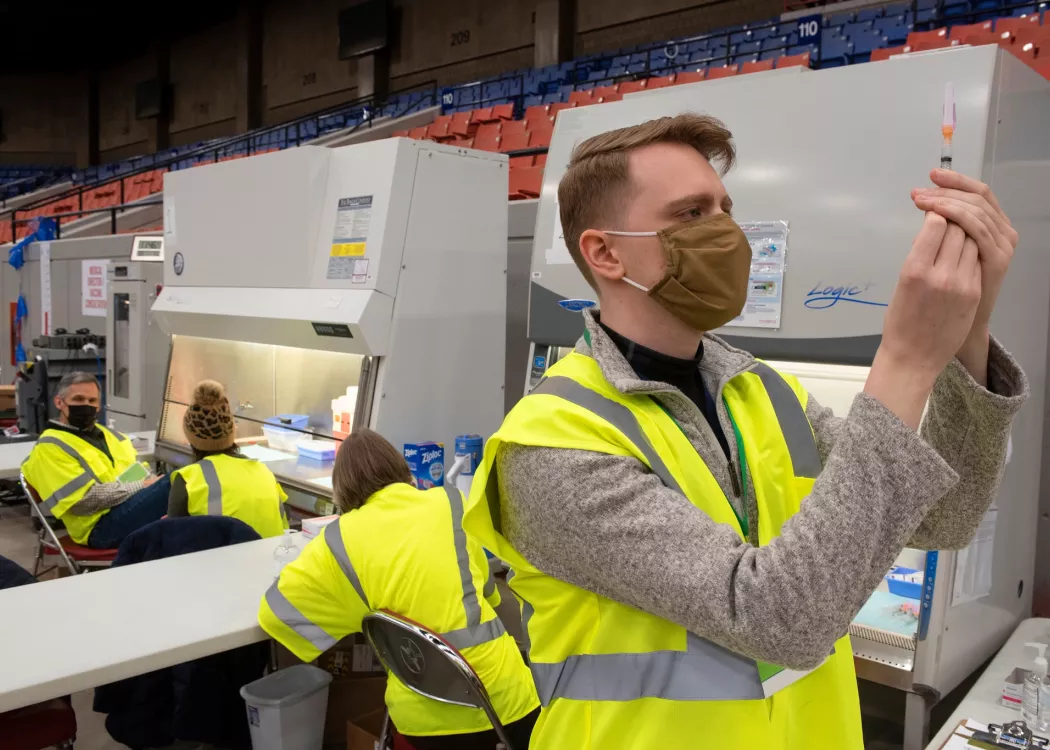 Drive through COVID-19 vaccinations at Broadbent Arena.