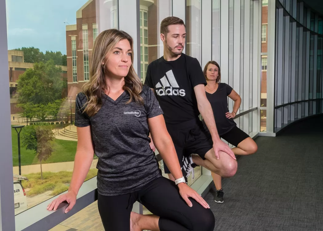 Employees practicing yoga