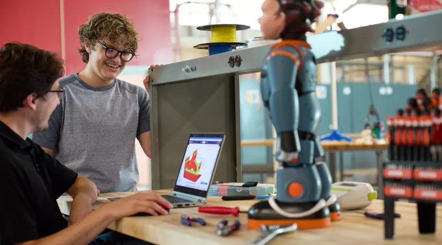 Students talking about an engineering project.