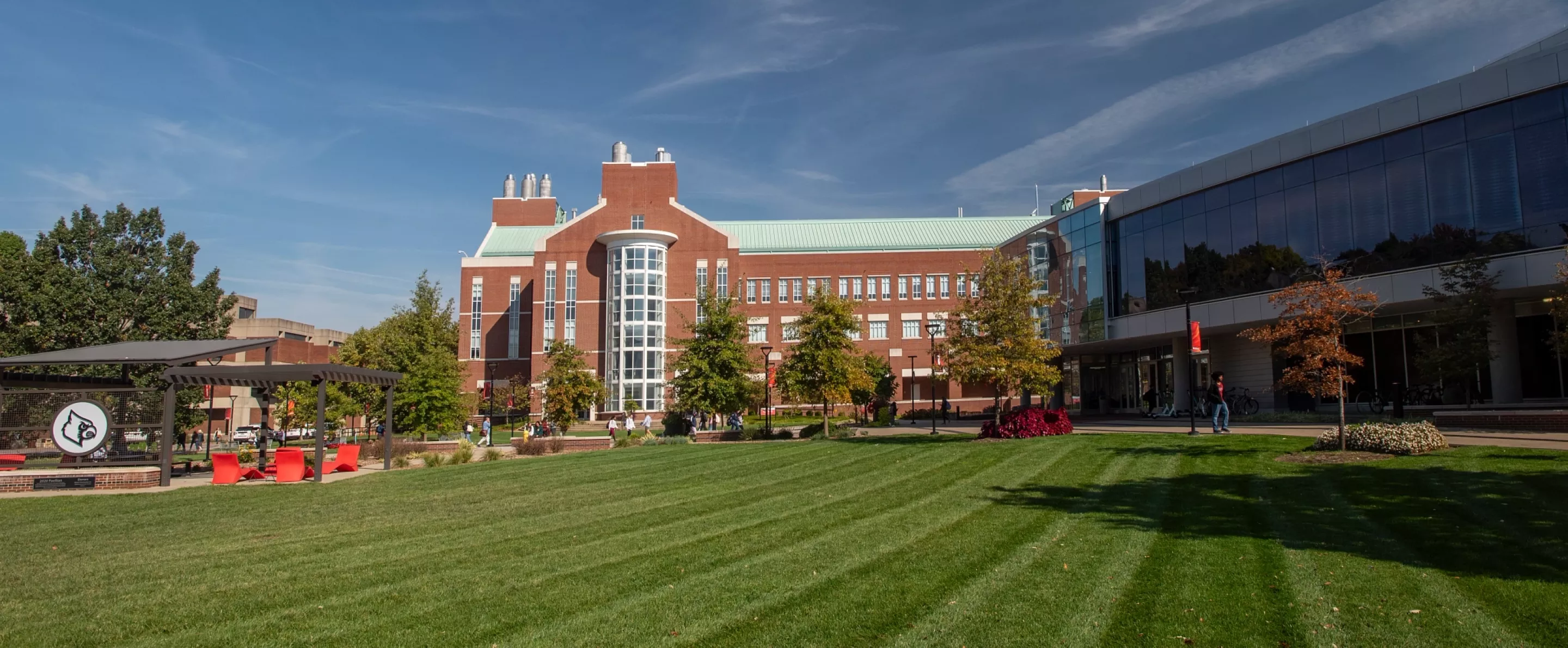 Schumaker Hall, the Belknap Academic Building and the 2020 Pavilion on a bright fall day.