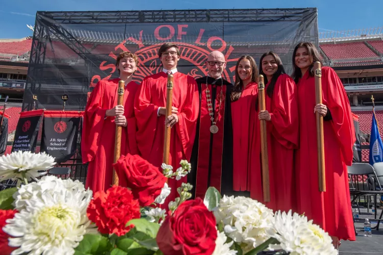 President Bradley with a group of students